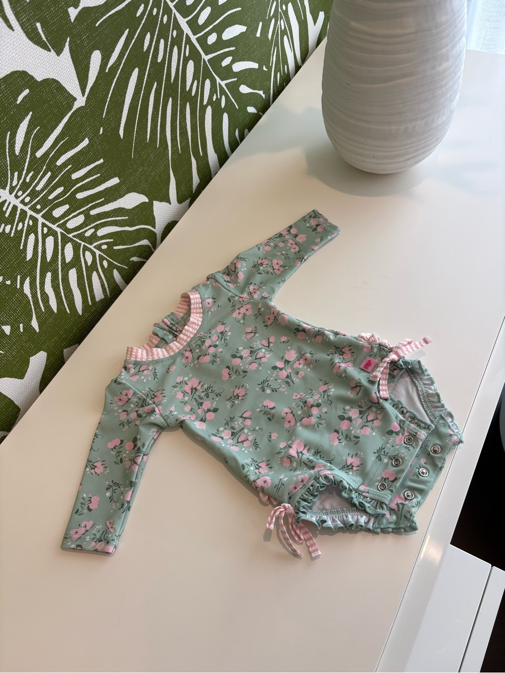 RuffleButts Mint Green Floral Baby Romper with Pink Accents